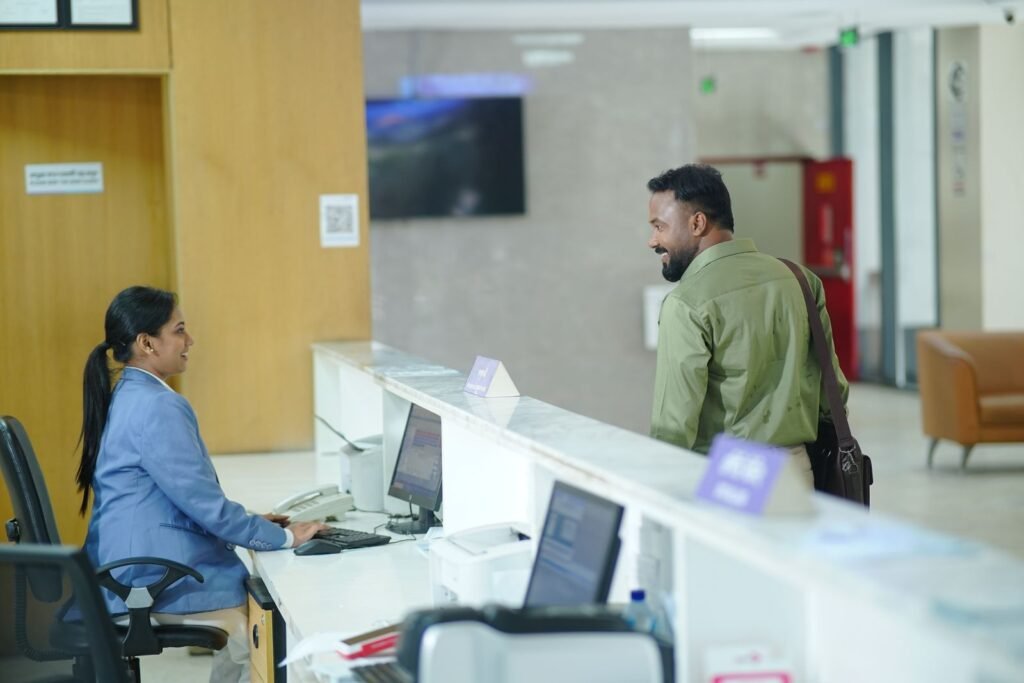 Concierge assisting a resident at the front desk
