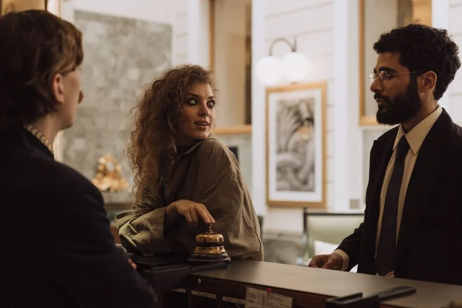 Concierge helping a resident at the front desk