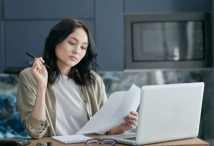 Regional manager reviewing portfolio reports
